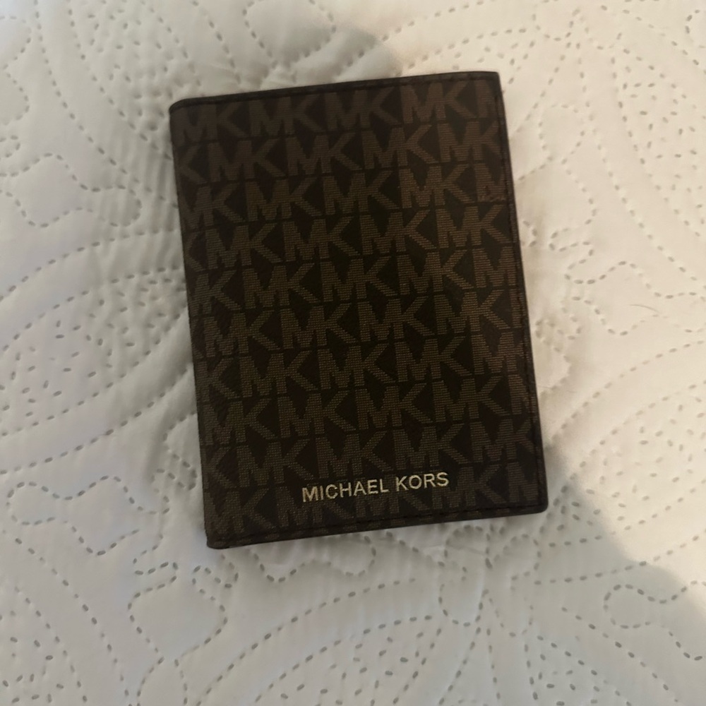 Michael Korrs passport cover